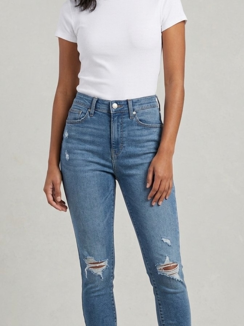 Denizen from Levi's Medium Blue Skinny Jeans with Distressed Knees.  WP 23